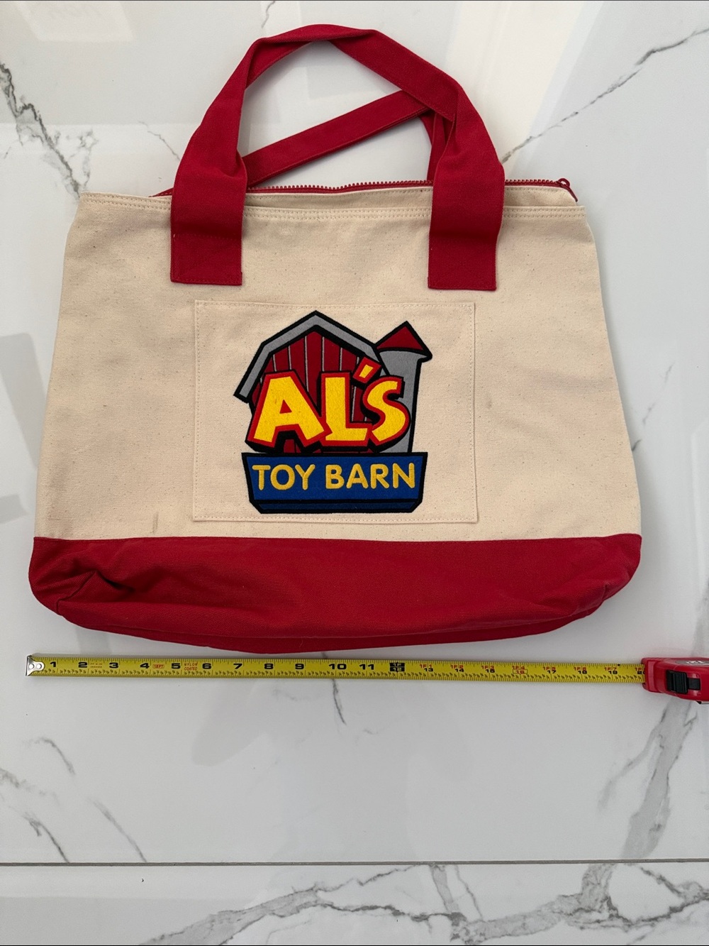 Disney Al's Toy Barn Canvas Tote in Red and Cream
